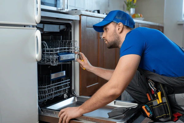 repair dishwashers repairman repairing dishwasher 600nw 1944312772